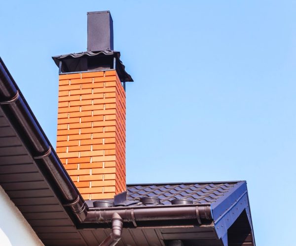 brick-chimney-roof-private-house-background-blue-sky-Large